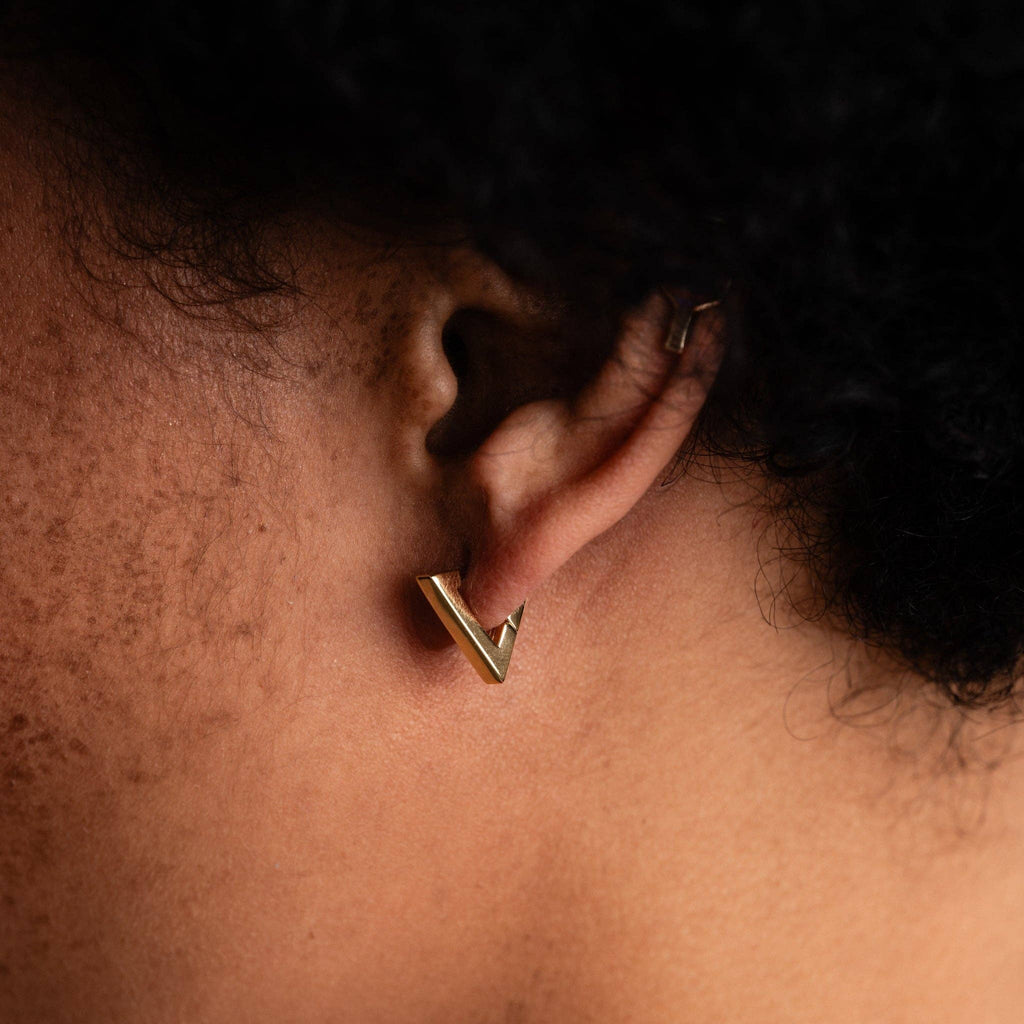 Triangle Huggie Hoops | 14k gold-plated brass
